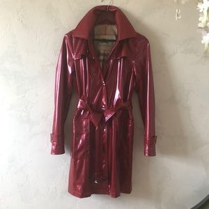 Burberry raincoat excellent condition.
